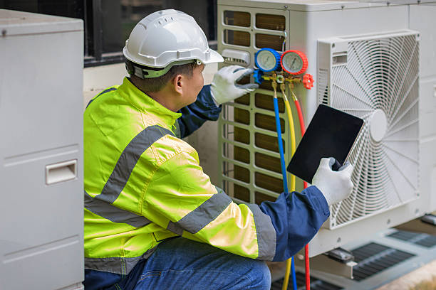 Professional Hvac technician working in Hampton, IL